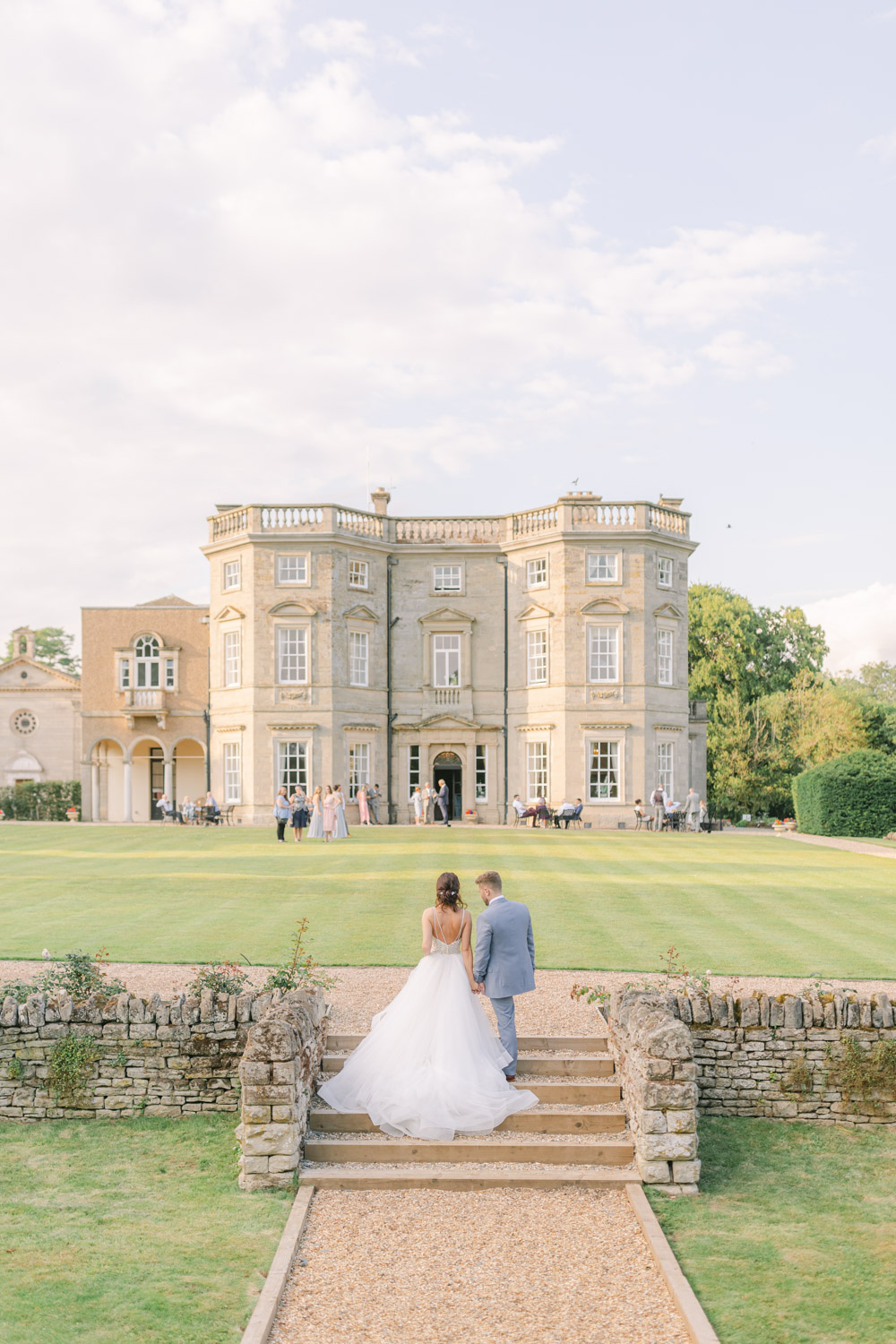 Bourton Hall Wedding venue on a summer day with bride and groom